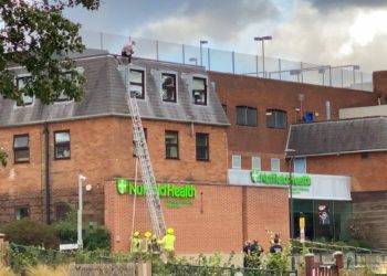 The man is sat above Nuffield Health, overlooking Elms Field. Picture: Sam Regan