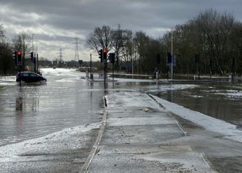 Traffic diversions are in place at the Showcase cinema roundabout, where deep flood water has blocked lanes of traffic. Picture: Phil Creighton