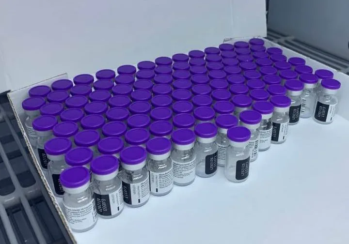 Coronavirus vaccine surge testing vaccination covid 18-24 young people