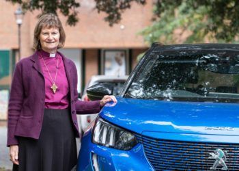 Bishop Olivia with her new electric car Picture: Steven Buckley/Diocese of Oxford