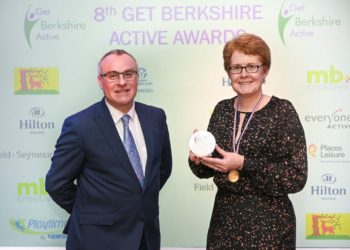 Liz McDaniel  collects the Youth Engagement Project of the Year Award  on behalf of the Me2Club from Mike Diaper at last year’s Get Berkshire Active awards