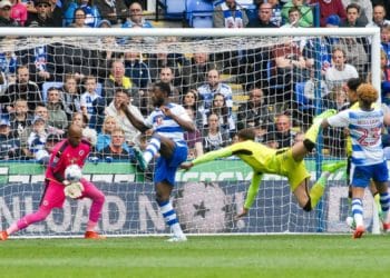 Ali Al Habsi saves with Blackett and Williams defending