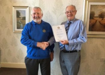 David receiving his awarded from Nigel Boshier