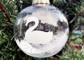 The team at Share Wokingham are honouring Des Harding with a swan bauble Pictures: Share and Sam Harding