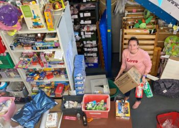 Emma Cantrell in the First Days warehouse in March – the charity is receiving around 20 Amazon parcels every day, as people buy items from its wish list