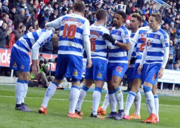 Group hug after the goal