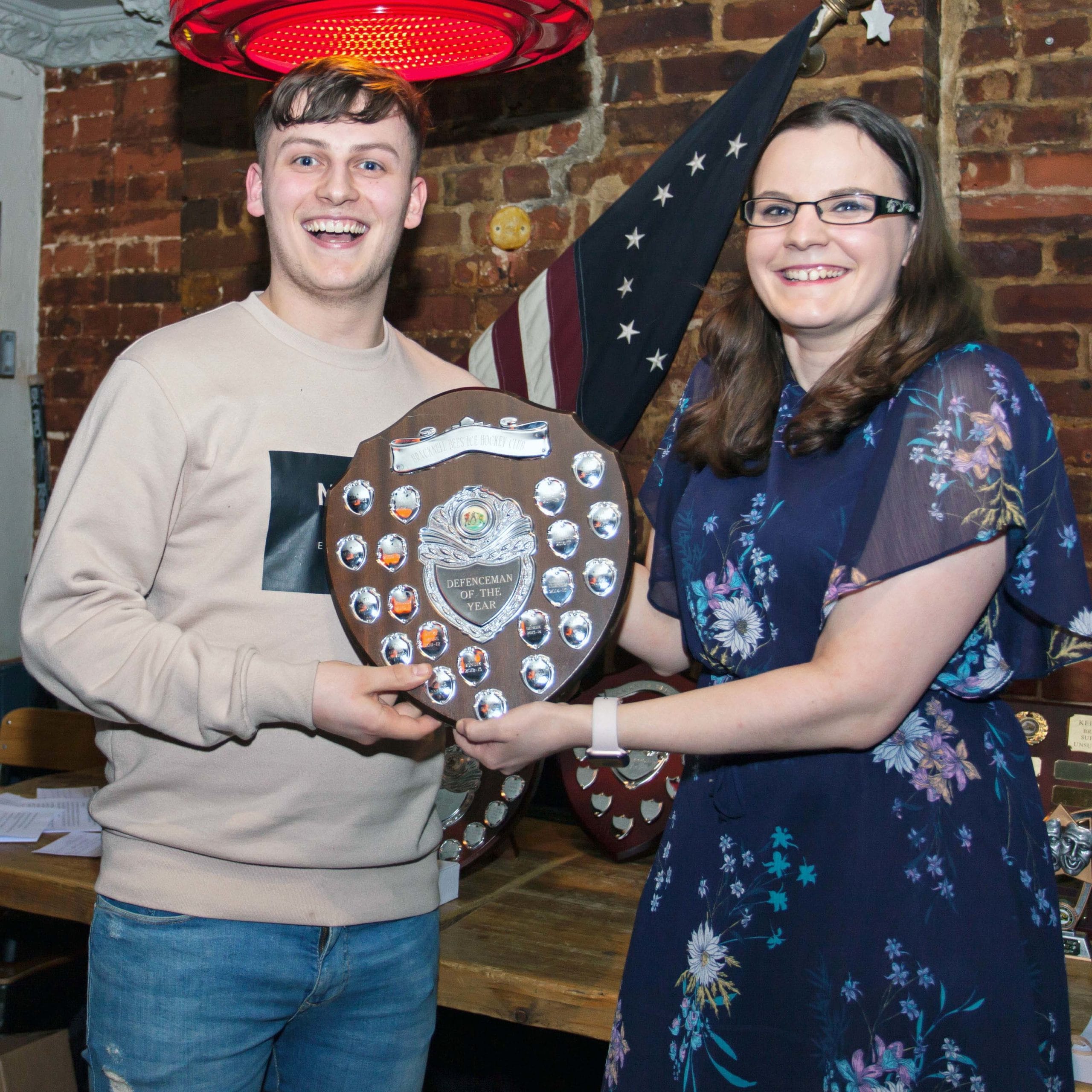 Harvey Stead collects the Best Defenceman trophy on behalf of Jan Bendik