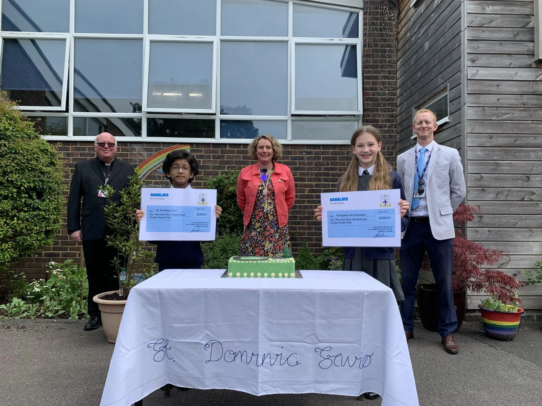 From left: Father Bill, Jayden Salve, head boy, Lucy Teixeira, Chloe Zambon, head girl and Patrick Mullens, assistant head teacher
