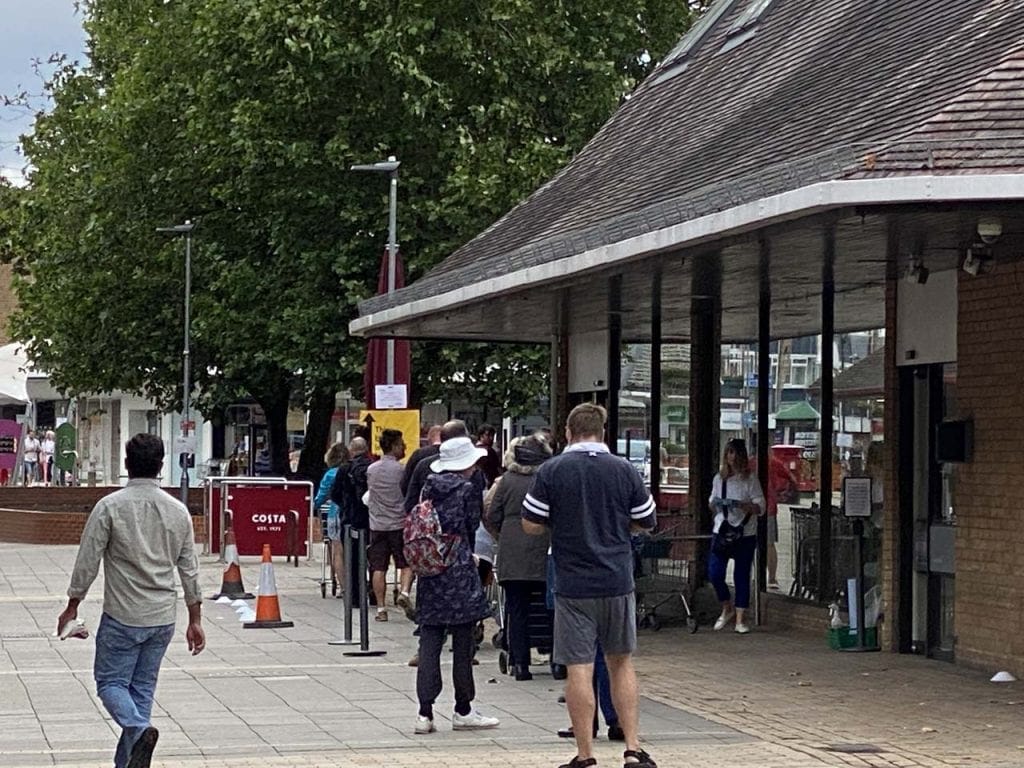 Shoppers queue waitrose