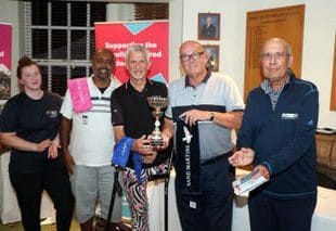 The winning team at the Berkshire Vision golf day with event organiser Alan Leason (right)