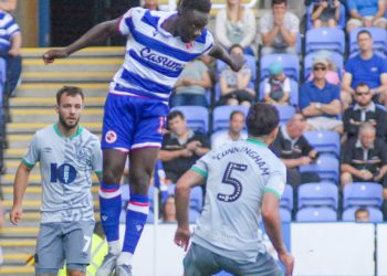 Andy Yiadom leaps for a header