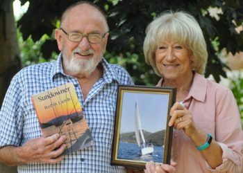 Robin and Helen Lamb with their book Sundowner, named after their sailing boat Picture: Steve Smyth
