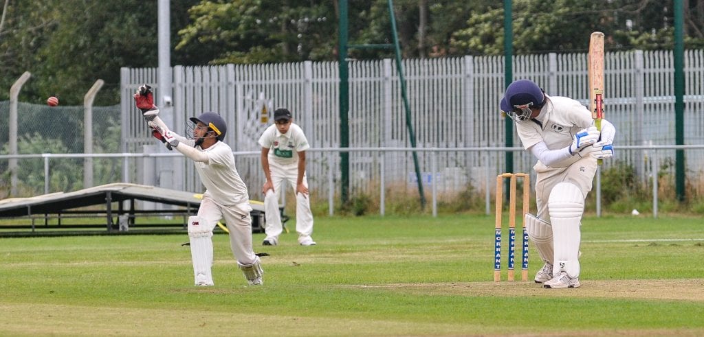 Emmbrook & Bearwood 2s (batting) v Penn & Tylers Green 2s Sanjeev Jain steers the ball past the wicketkeeper.