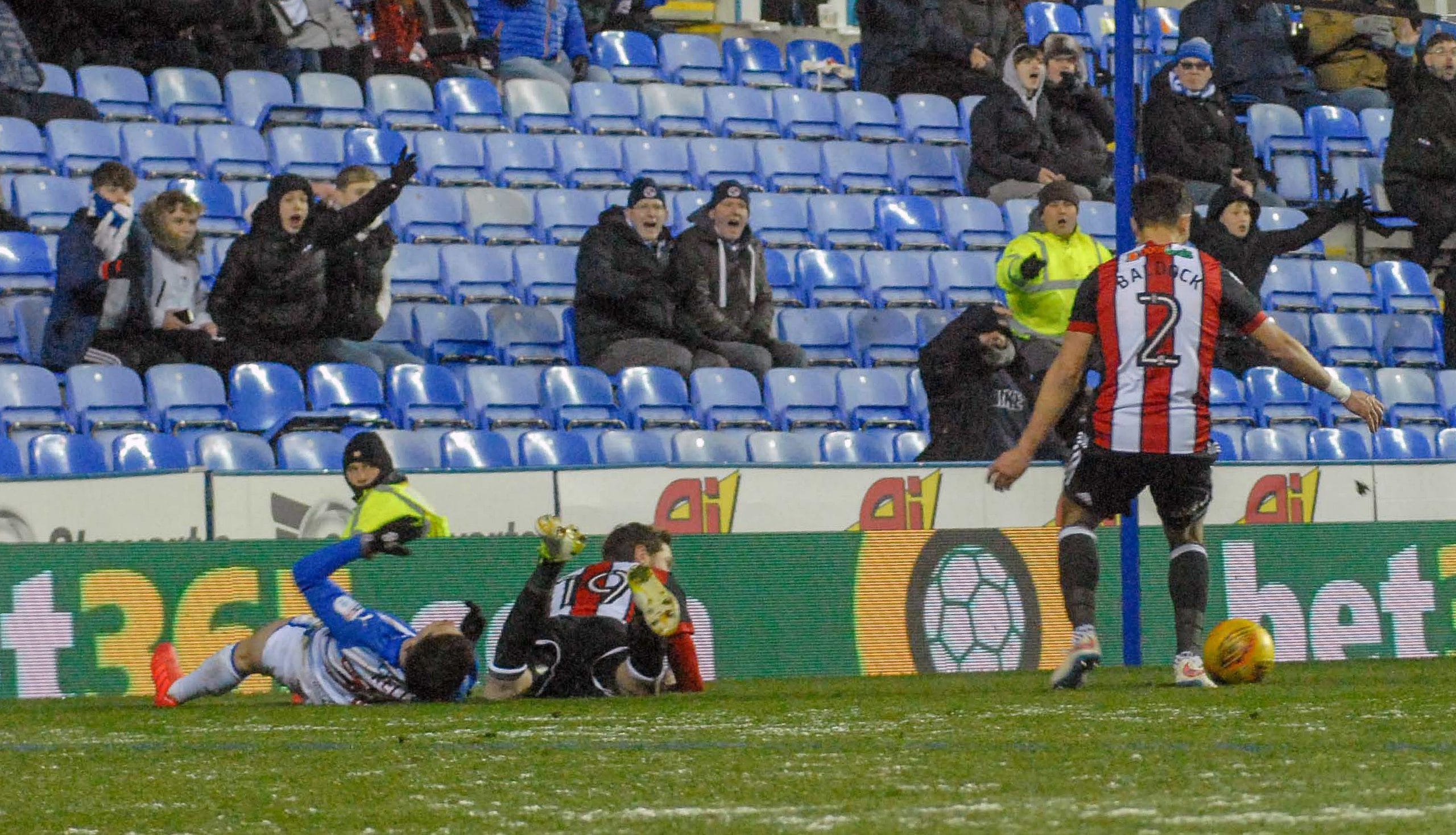 Liam Kelly is fouled by Richard Stearman