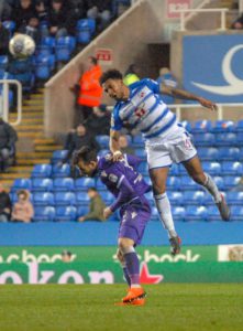 Liam Moore beats Adam Le Fondre to the ball