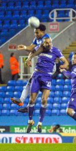 Liam Moore rises above Darren Pratley