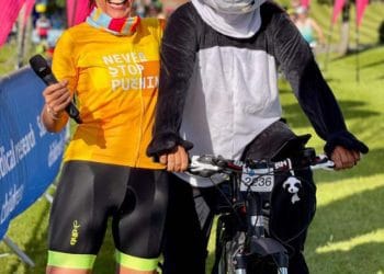 ALL SMILES FOR THE PANDA: Davina McCall with the Earley Panda at the Big Sussex Bike Ride