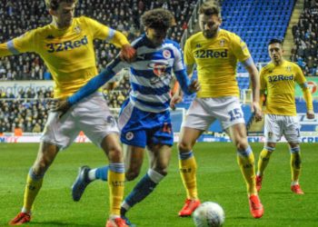 Michael Olise takes on the Leeds defence