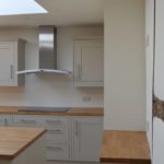 Modern kitchen ancient wall