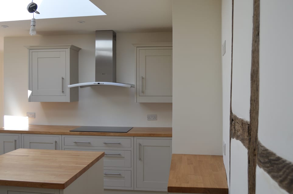 Modern kitchen ancient wall