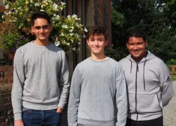 Chris Peat, Henry O'Brien and Ronnie Jha celebrate their results