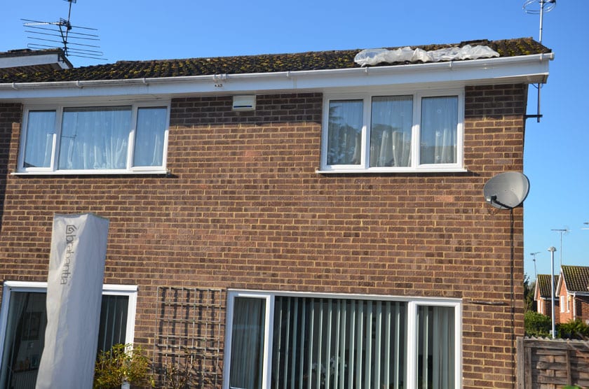 The damaged roof - a block of ice fell from the sky on Sunday. Picture: Paul King