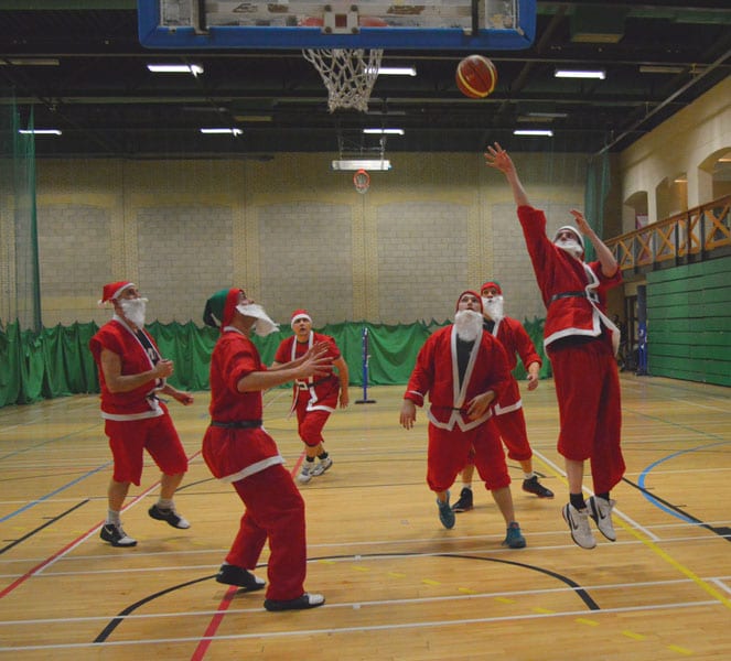 Santa playing basketball