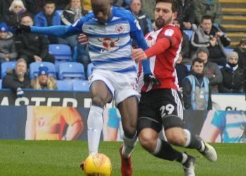 Sone Aluko is hauled back