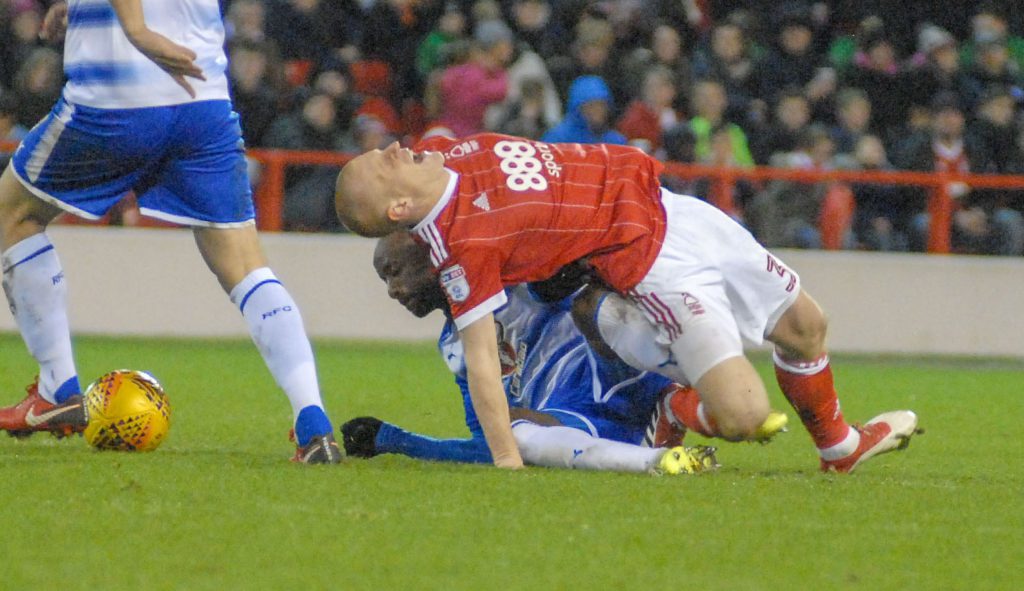 Sone Aluko slides in on Ben Watson