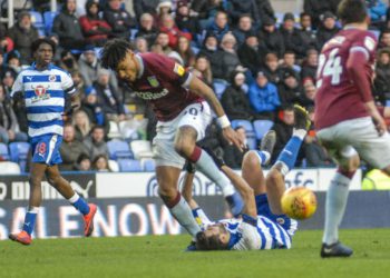 Tyrone Mings collides with Nelson Oliveira