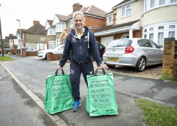 RECYLING: Cllr Parry Batth smiles with the new bags. Picture: Stewart Turkington