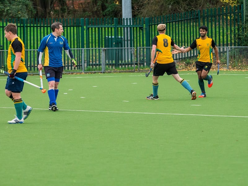 Ravi Patel (right) celebrates what would prove to be the winning goal for the hosts