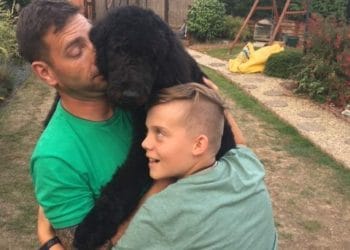 The Wiggs family with their assistance dog, Camo. Picture: Deborah Wiggs