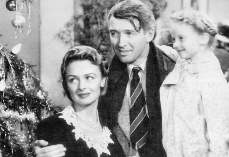 George Bailey (James Stewart), Mary Bailey (Donna Reed), and their youngest daughter Zuzu (Karolyn Grimes) in the Christmas movie It's a Wonderful Life Picture: Wikipedia