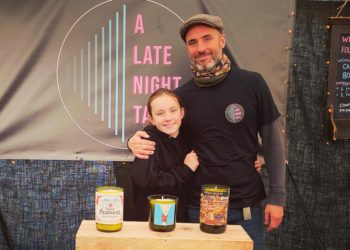 Eldest daughter LIzzie (left, with dad Ivan) often helps on A Late Night Tale's stall Picture: Gemma Chadwick