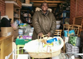Josimah Baby Bank's founder Buki Adedoyin-Benson, with a newborn bundle assembled from new and donated items Picture: Natalie Burton