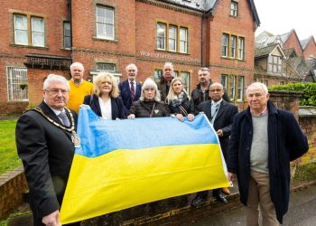 Earlier this month, politicians, council officers gathered to watch Wokingham Borough mayor, Cllr Keith Baker, raise a Ukrainian flag at Shute End as a symbol of solidarity against the invasion by Putin's troops Picture: Stewart Turkington