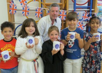 Paul Palmer of Hurst jubilee committee with, from left, Jack, five, Clementine, eight, Lucy, five, William, nine, and Dhiyan, eight