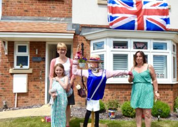 The Wade family with their gardening Queen. Picture: Emma Merchant