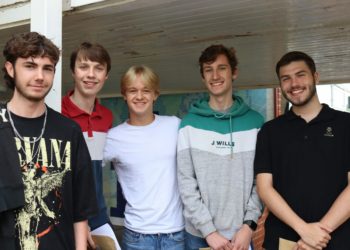 DELIGHTED: Year 13 students receiving their A-Level results this morning Picture: The Emmbrook School