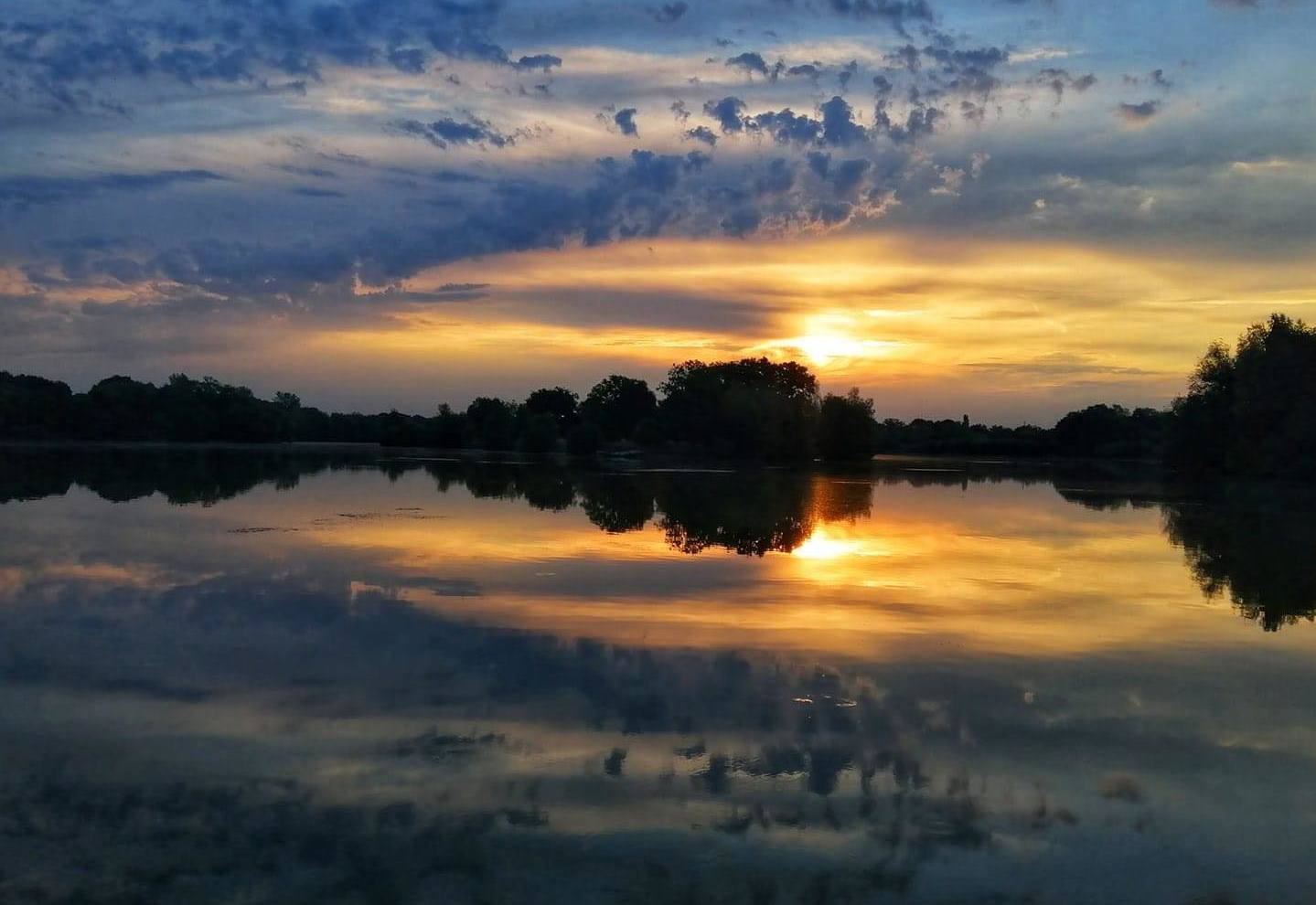 Inside Out: a picture of sunrise at Dinton Pastures, taken by Ritesh Nigam