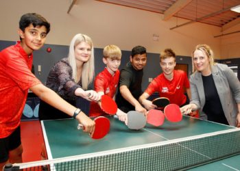 Kingfisher Table tennis Club players Prayrit Ahluwalia (far left), Harry Randall and Jamie Barlow with head coach Ajay Naik with Alix Laflin (marketing manager for Vistry Thames Valley) and Lycee Marsh (marketing assistant at Vistry Thames Valley)