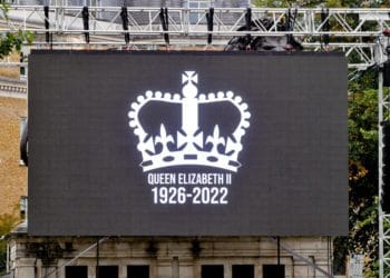 The Funeral Service of the Queen on a large screen in the Forbury Gardens.