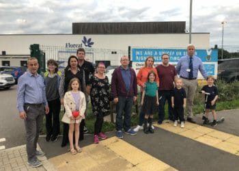 Parents and children are calling for a safe crossing and a 20mph speed limit on William Heelas Way in Wokingham Picture: Charles Margetts