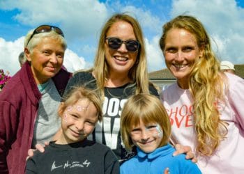 A family who recently escaped from Ukraine with organisers Rachel Walker (upper centre) and Sarah O'Neill (upper right). Picture: Steve Smyth