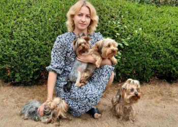 Anfisa Vlasova, 41, from eastern Ukraine, with her Yorkshire terriers Betty, Nora, Daisy and Teddy. Credit: Anfisa Vlasova