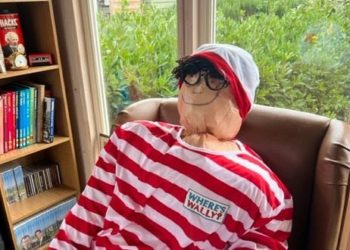Wally enjoying a quiet read at Abbeyfield Winnersh. Picture: courtesy of Abbeyfield Winnersh