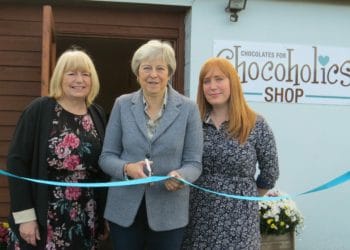 Liz and Victoria Cossey and MP Theresa May in the new Chocoholics shop Picture: Sue Corcoran