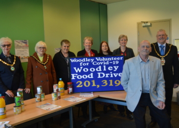Ronnie Goodberry (front) presented gifts and certificates to thank various Woodley people and groups for their support during the pandemic Picture: Phil Creighton