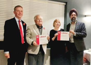 Labour MPs Tan Dhesi (Slough) and Matt Rodda (Reading East) present certificates to Jane Collins and Roy Mantel, who both marked 50 years of being members of the political party